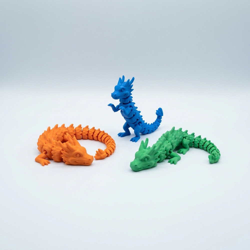 3D printed set of three articulated flexi dragons