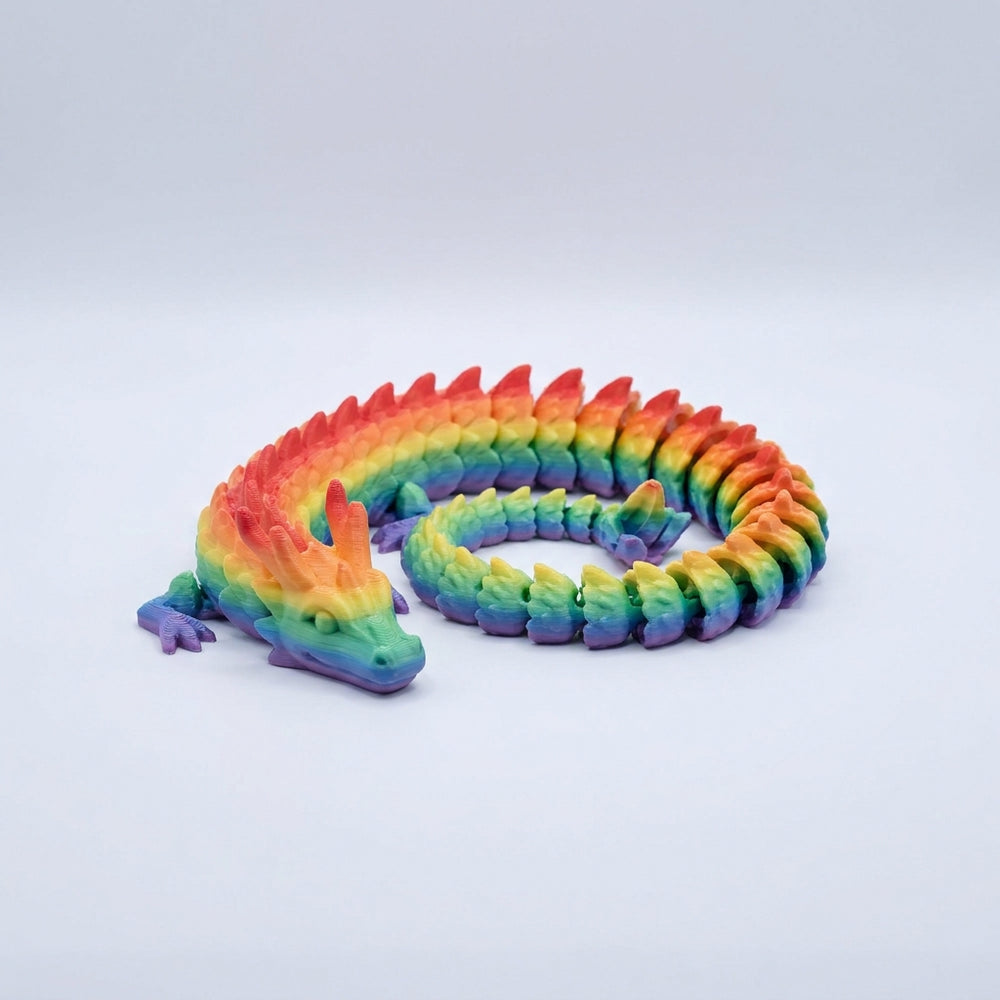 Articulated 3D printed flexi dragon in rainbow filament