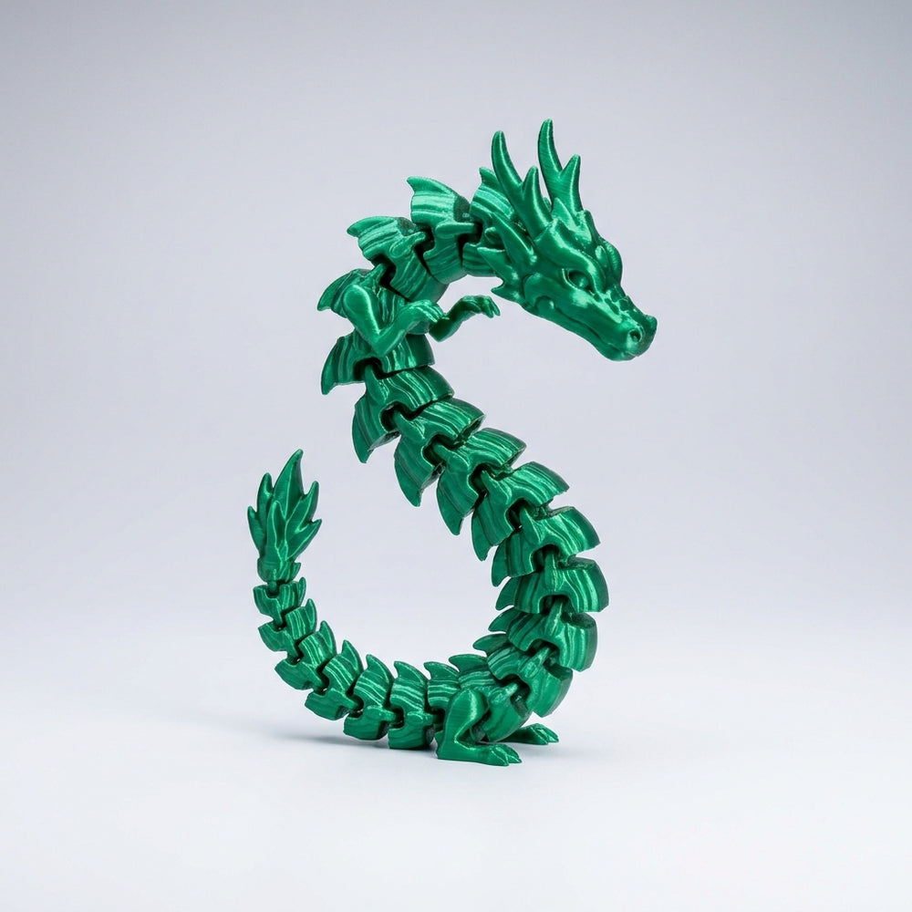 3D printed green articulated flexi dragon toy